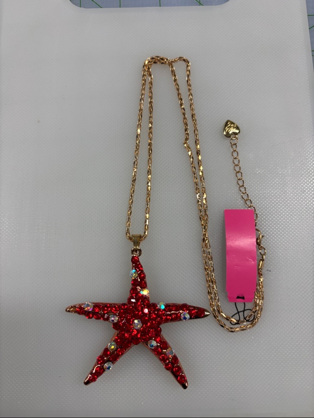 Red Crystal Starfish Necklace on Gold Tone Chain